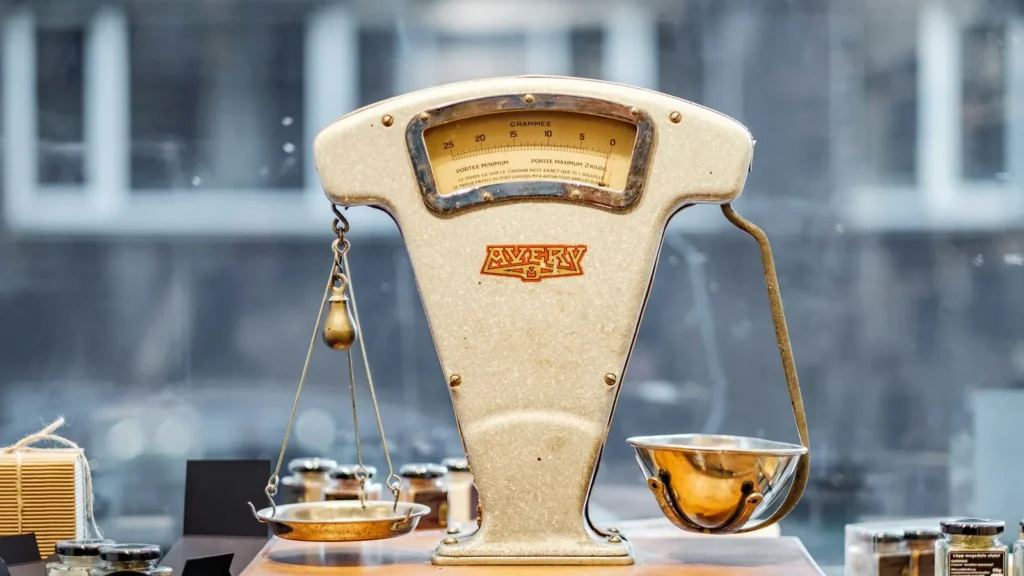 A vintage balance scale, weighing the disadvantages of a consumer proposal